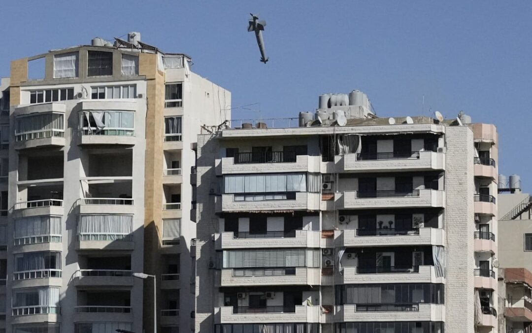 Photos capture exact moment Israeli missile strikes building in Beirut