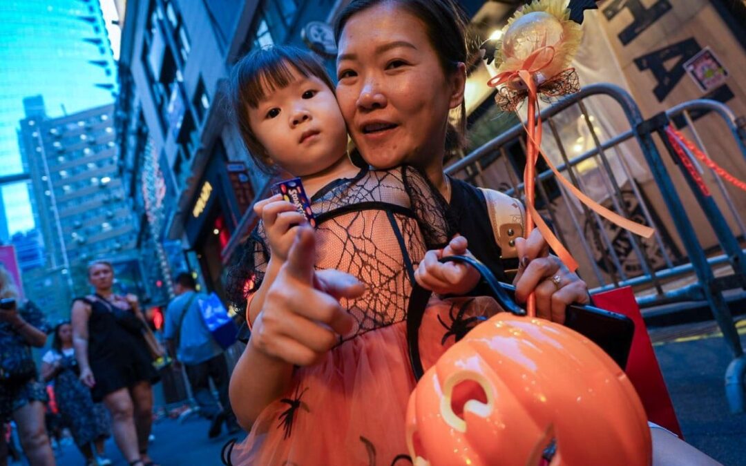 Hongkongers revel in Halloween trick-or-treating, flash mobs before night owls emerge