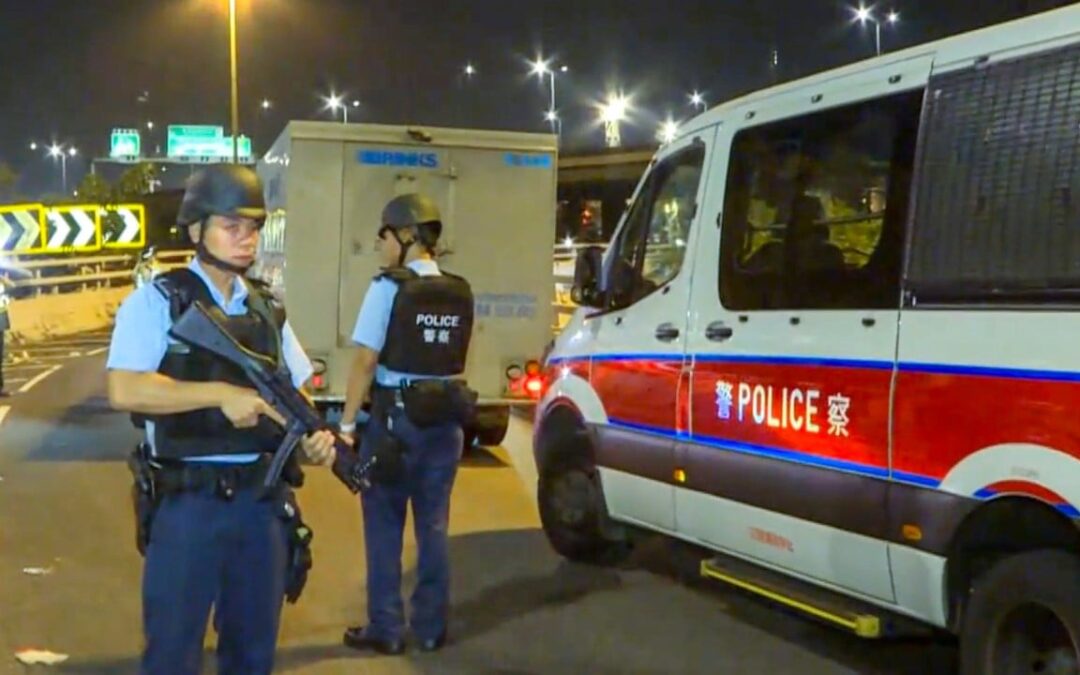 Hong Kong police deploy heavily-armed team to guard cash delivery van that crashed on flyover