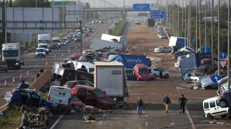 Spain searches for bodies after flood of the century claims at least 95 lives