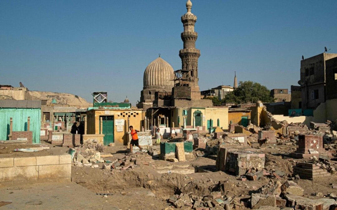 Egyptians exhume the dead as historic cemetery razed