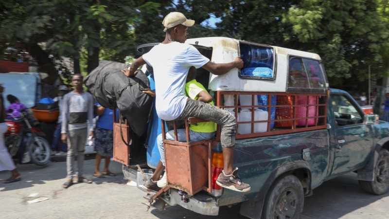 Masses flee homes in Haiti as gangs ratchet up violence amid political turmoil