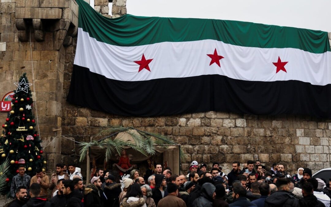 Hundreds protest in Syria after burning of Christmas tree sparks outrage among Christians