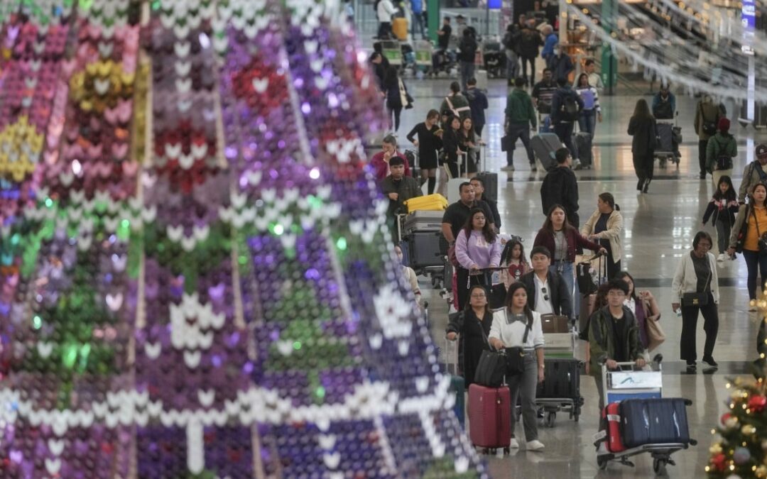 ‘Christmas vibe’ lures tourists to Hong Kong but more residents heading off