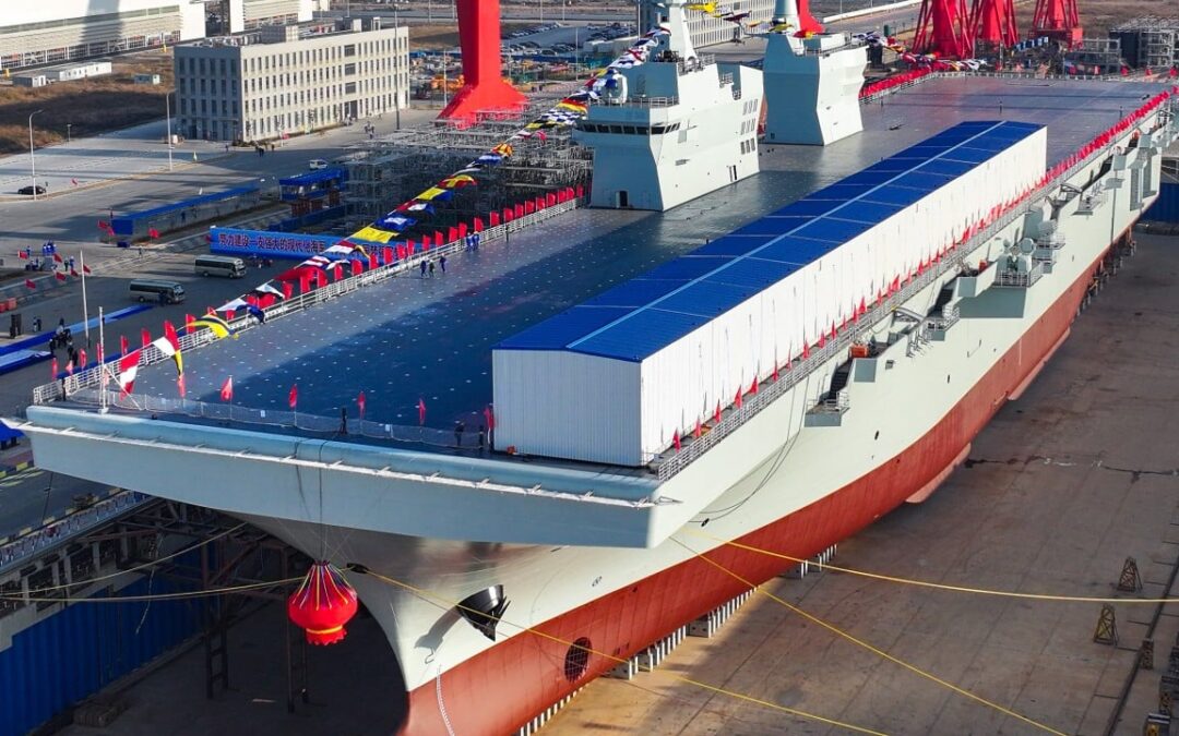 Could China’s newest amphibious warship, the Type 076, be in service next year?