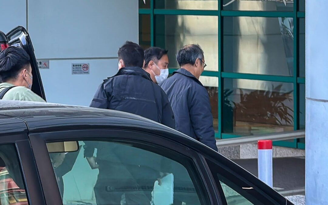 Hong Kong police take away pollster for investigation over aiding absconder