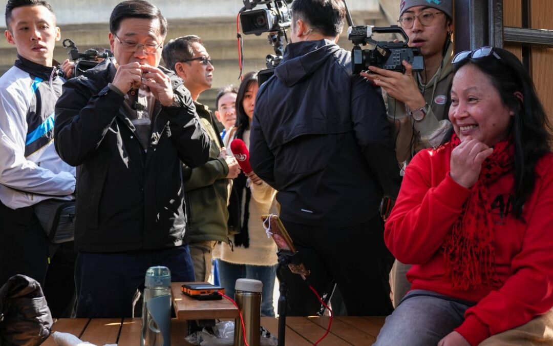 John Lee appreciates view from Hong Kong Island while touring new walkway