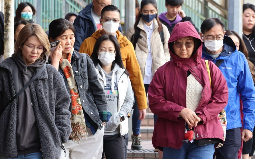 Flu outbreaks surge at Hong Kong schools as cold weather warning issued