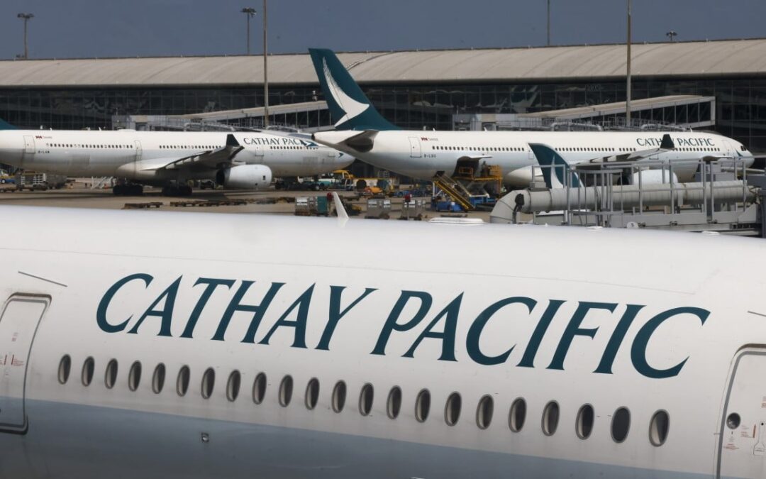 2 Cathay passengers charged over scuffle on flight from Japan to Hong Kong