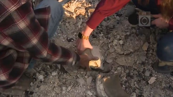 Man sifts through the debris of his burned home to find urn holding his late wife’s ashes