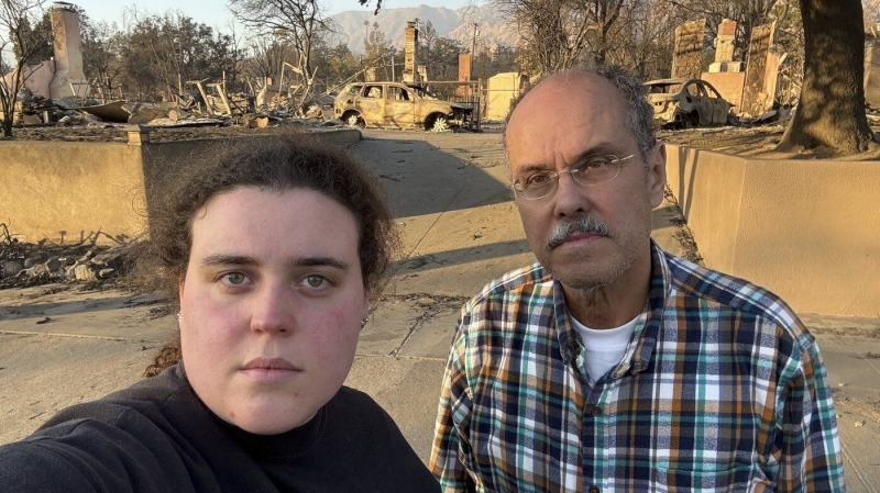 A dad and daughter help evacuees learn whether their homes survived the California wildfires