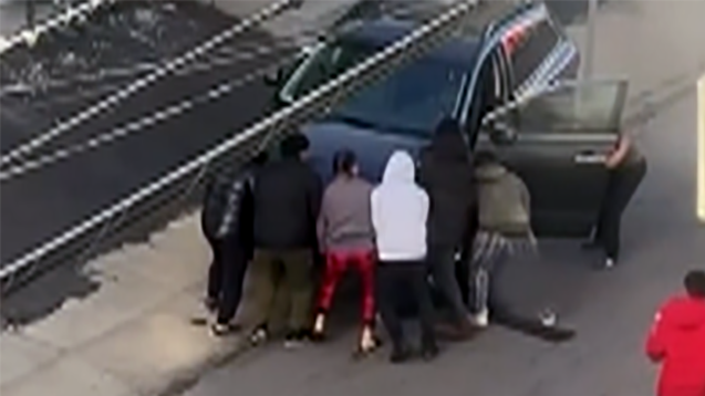 Heroes in action: Strangers lift car to rescue a woman pinned underneath