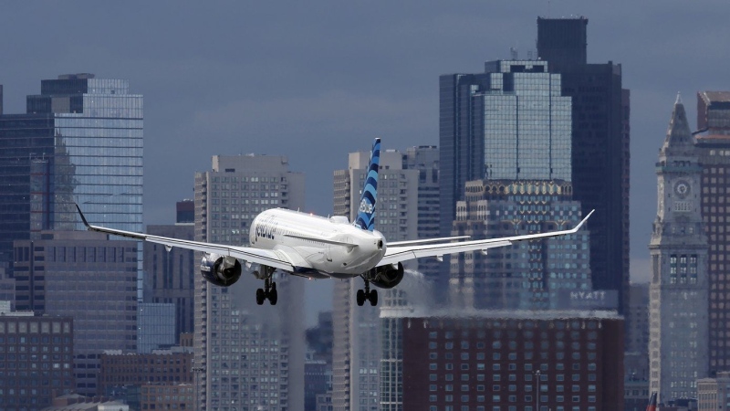 JetBlue passenger suddenly opens exit door as flight is taxiing for takeoff at Boston airport